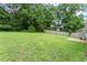 Expansive backyard featuring a large green lawn and a wooden deck for entertaining at 2756 Gresham Se Rd, Atlanta, GA 30316