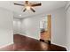 Cozy bedroom with fan, hardwood floors, and easy access to other rooms at 2756 Gresham Se Rd, Atlanta, GA 30316