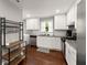 Charming kitchen with white cabinets, stainless steel appliances, and hardwood floors at 2756 Gresham Se Rd, Atlanta, GA 30316
