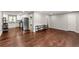 Open-concept living space featuring hardwood floors and seamless flow into the kitchen at 2756 Gresham Se Rd, Atlanta, GA 30316