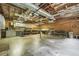 Unfinished basement featuring exposed ceiling, utility system and concrete flooring ready for customization at 291 N Briar Rdg, Woodstock, GA 30189
