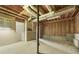 Unfinished basement with concrete floor and exposed ducts, presenting a blank canvas at 291 N Briar Rdg, Woodstock, GA 30189