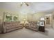 Living room featuring a ceiling fan, two taupe-colored sofas and neutral toned walls at 291 N Briar Rdg, Woodstock, GA 30189
