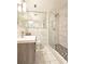 Updated bathroom featuring modern fixtures, tiled shower, and sleek vanity at 3060 Pharr Court North Nw # 719, Atlanta, GA 30305