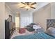 Well-lit bedroom features lots of storage space and carpeted floors at 3060 Pharr Court North Nw # 719, Atlanta, GA 30305