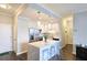Bright kitchen featuring marble island, stainless steel appliances, and modern lighting at 3060 Pharr Court North Nw # 719, Atlanta, GA 30305