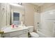 Bathroom with a tub and shower combo, and a single sink vanity at 760 Celeste Sw Ln, Atlanta, GA 30331
