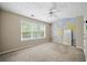 Bedroom with a large window and unique painted geometric wall feature at 760 Celeste Sw Ln, Atlanta, GA 30331