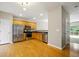 Modern kitchen with stainless steel appliances and wood cabinets at 760 Celeste Sw Ln, Atlanta, GA 30331