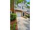Charming townhouse with brick and siding exterior, front yard, and attached garage at 760 Celeste Sw Ln, Atlanta, GA 30331