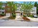 Charming townhouse with brick and siding exterior, front yard, and attached garage at 760 Celeste Sw Ln, Atlanta, GA 30331
