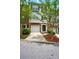 Charming townhouse with siding exterior, front yard, and attached garage at 760 Celeste Sw Ln, Atlanta, GA 30331