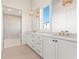 Bathroom features double sinks, marble countertops and glass enclosed shower at 260 Guild Ln, Fayetteville, GA 30214