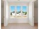 Bright bedroom features three large windows offering natural light and views of the outdoors at 260 Guild Ln, Fayetteville, GA 30214