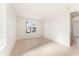 Bright bedroom with hardwood floors and a large window providing ample natural light at 260 Guild Ln, Fayetteville, GA 30214