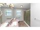 This bathroom features a vanity, large mirrors, and accessible handrails at 409 Ivy Terrace Dr, Dallas, GA 30157