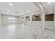 Open basement space with great flow, flexible layout, and recessed lighting at 148 Copper Hills Dr, Canton, GA 30114