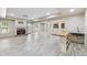 Finished basement featuring a stone fireplace, wet bar, and durable floors at 148 Copper Hills Dr, Canton, GA 30114