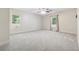 Bright bedroom with neutral color palette, soft carpet, and ample natural light at 148 Copper Hills Dr, Canton, GA 30114