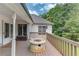 A wooden deck offers a spot for outdoor living and overlooks the spacious backyard at 2005 Ashton Pointe Dr, Dacula, GA 30019
