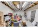 The unfinished basement is shown full of stored personal belongings at 2005 Ashton Pointe Dr, Dacula, GA 30019