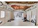 Spacious basement with exposed duct work and potential for a home gym or recreation area at 2005 Ashton Pointe Dr, Dacula, GA 30019