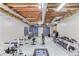 Basement home gym featuring weightlifting equipment and exposed ceiling at 2005 Ashton Pointe Dr, Dacula, GA 30019