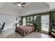 Primary bedroom with vaulted ceilings, a ceiling fan, and natural light at 2005 Ashton Pointe Dr, Dacula, GA 30019