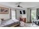 Bedroom with a ceiling fan, television, and grey walls at 2005 Ashton Pointe Dr, Dacula, GA 30019