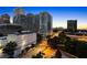 The building set against a vibrant urban skyline at 215 Piedmont Ne Ave # 1001, Atlanta, GA 30308