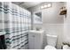 Bathroom featuring a vanity, mirror, and a shower with a stylish curtain at 215 Piedmont Ne Ave # 1001, Atlanta, GA 30308