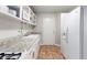 Well-lit kitchen with ample counter space and storage, featuring a clean, efficient design at 215 Piedmont Ne Ave # 1001, Atlanta, GA 30308