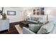 Cozy living room with neutral walls, wood floors and comfortable seating at 215 Piedmont Ne Ave # 1001, Atlanta, GA 30308