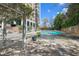 Enjoy a relaxing day at the pool with lush green landscape surroundings at 215 Piedmont Ne Ave # 1001, Atlanta, GA 30308
