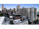 Expansive daytime aerial view of downtown buildings, showcasing the urban landscape at 215 Piedmont Ne Ave # 2208, Atlanta, GA 30308