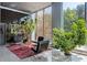 Inviting lobby with comfortable seating, lush plants, and large windows showcasing natural light at 215 Piedmont Ne Ave # 2208, Atlanta, GA 30308