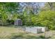 Well-maintained backyard featuring a storage shed and raised garden beds, perfect for gardening enthusiasts at 2637 Elkhorn Dr, Decatur, GA 30034