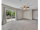 Spacious bedroom with a sliding glass door and ceiling fan at 2637 Elkhorn Dr, Decatur, GA 30034
