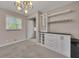Dining area with built-in bar and cabinet area perfect for entertaining at 2637 Elkhorn Dr, Decatur, GA 30034