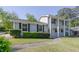 Inviting front view of the house showing the lawn, front walk and surrounding greenery at 2637 Elkhorn Dr, Decatur, GA 30034