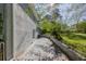 Exterior brick side view with a grassy area and trees at 2637 Elkhorn Dr, Decatur, GA 30034