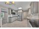 Modern kitchen with stainless steel appliances and stone countertops at 2637 Elkhorn Dr, Decatur, GA 30034