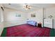 Bright, large bedroom featuring a unique decorative ceiling fan at 3000 Cathedral Place Pl, Decatur, GA 30034