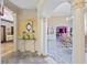 Elegant hallway featuring marble flooring, decorative pillars, and access to various rooms in the home at 3000 Cathedral Place Pl, Decatur, GA 30034
