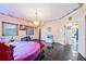 Large main bedroom with a round bed, and view into other rooms at 3000 Cathedral Place Pl, Decatur, GA 30034