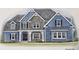 Charming two-story home featuring a stone facade, dormer windows, and a covered front porch at 169 West Lake Blvd, Carrollton, GA 30116