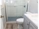 Bathroom features walk-in shower and tiled floor at 199 Candy Ln, Canton, GA 30115