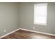 Bedroom with hardwood flooring and a window at 199 Candy Ln, Canton, GA 30115