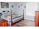 Comfortable bedroom with natural light and hardwood flooring at 199 Candy Ln, Canton, GA 30115