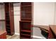 Custom closet with wood shelves and built-in desk at 199 Candy Ln, Canton, GA 30115
